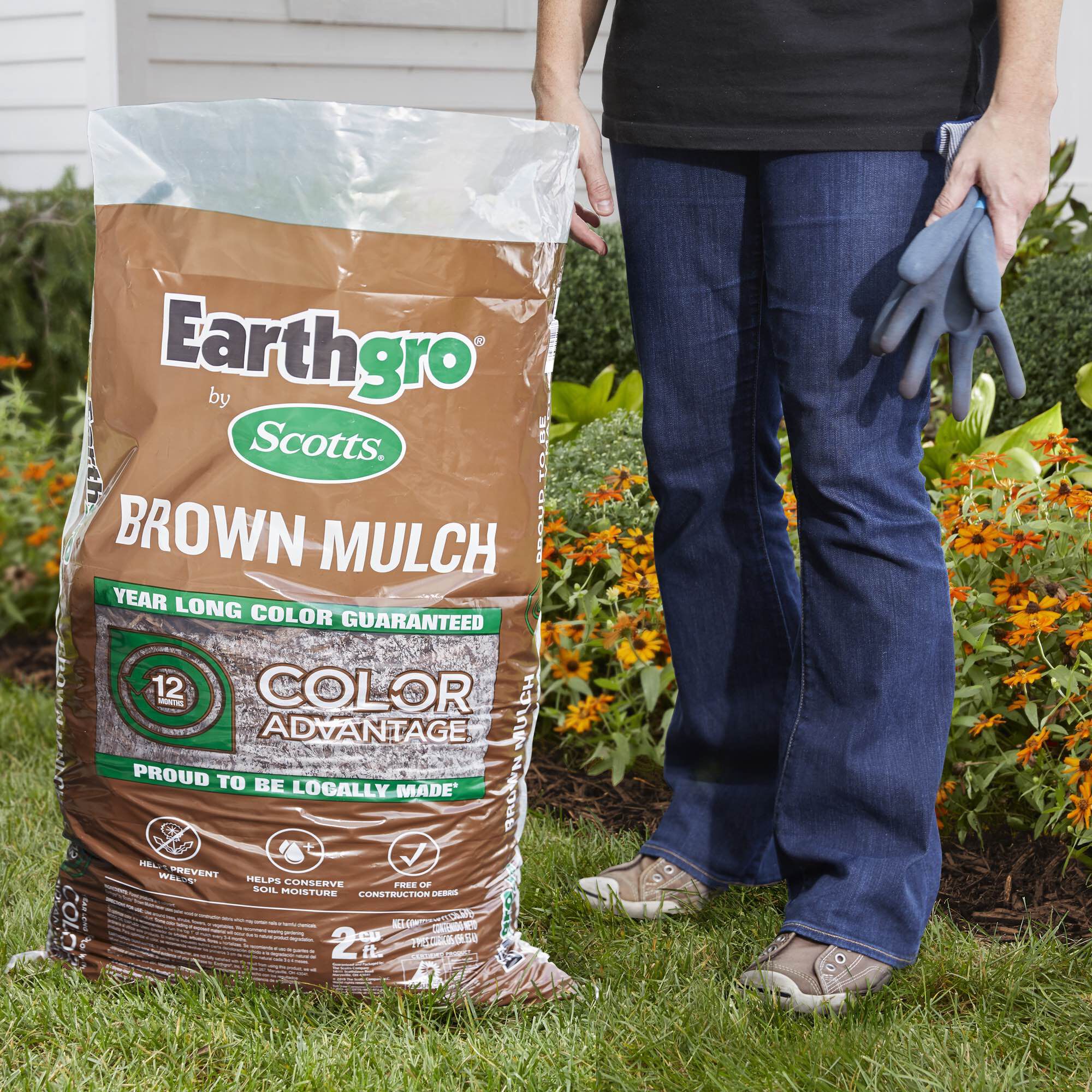 Image of Pile of Scotts red mulch in a garden center